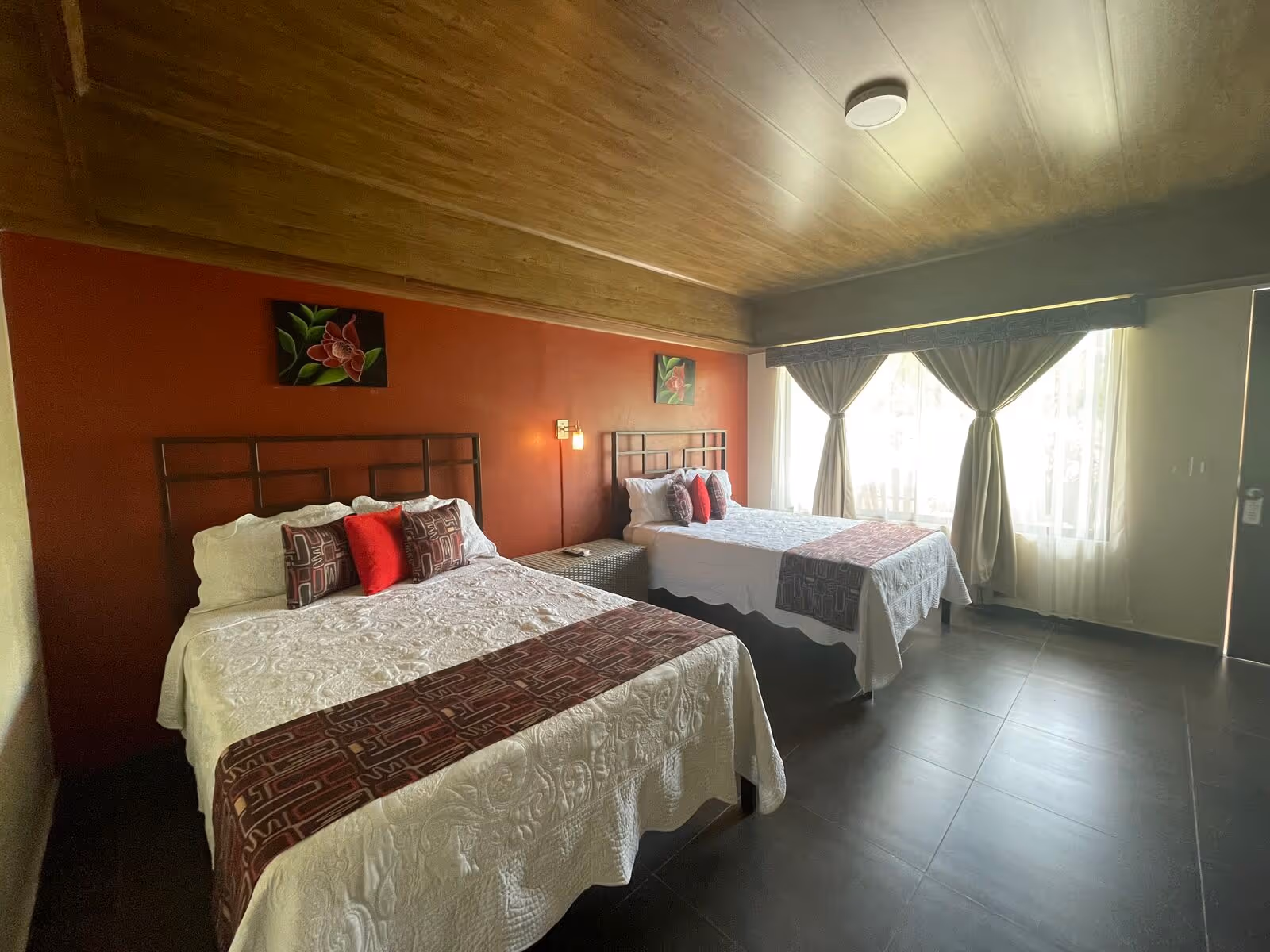 Deluxe King Room with king-size bed at Hotel Campos Arenal